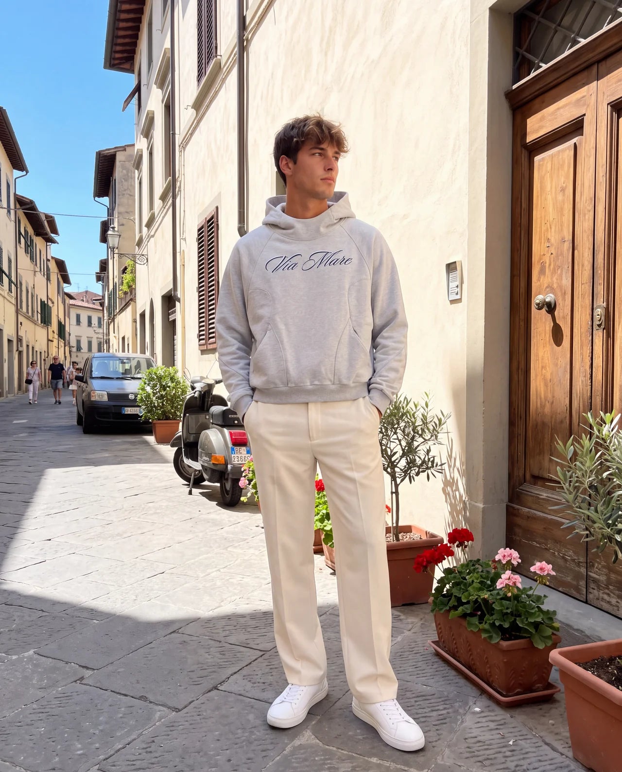 Felpa Firma · Signature Hoodie